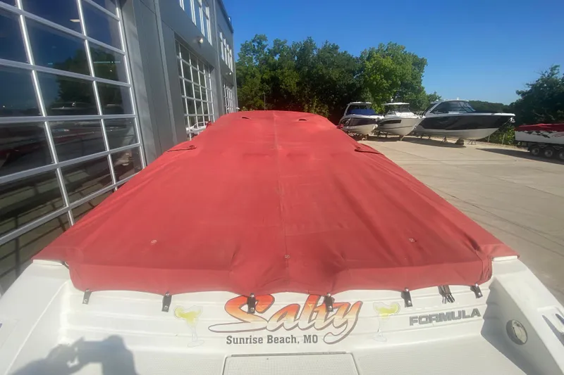 Slide: The Image of 2002 Formula 382 FASTech boat with red cover, parked at Sunrise Beach, MO. - 51