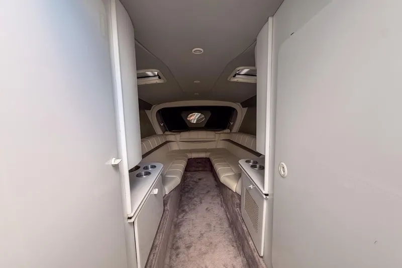 Slide: The Image of Interior of a 2002 Formula 382 FASTech boat, featuring plush seating and modern design. - 7