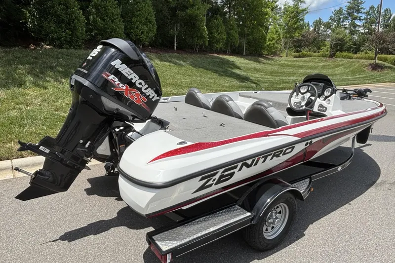 Slide: The Image of 2014 Nitro Z-6 boat with Mercury Pro XS engine on a trailer. - 18