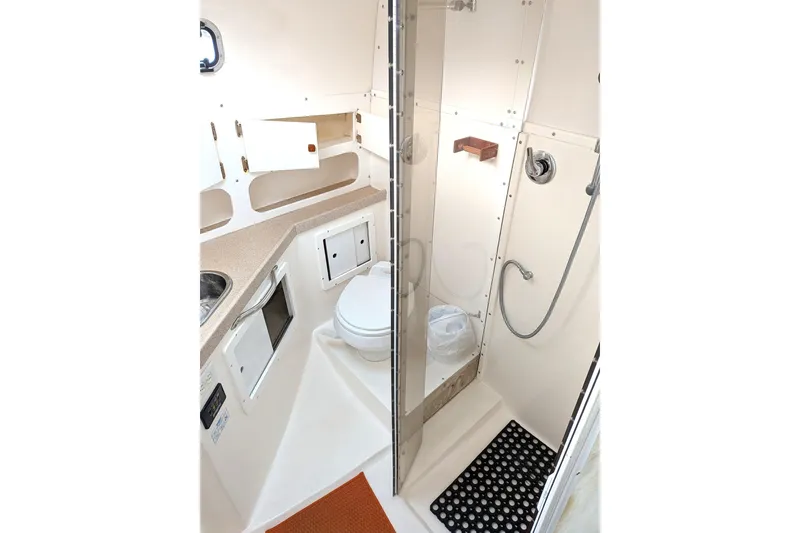 Slide: The Image of Compact bathroom in 2003 Atlas Acadia 32 boat with shower and toilet. - 37