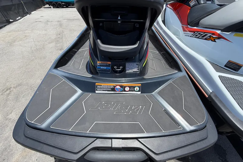 Slide: The Image of 2024 Kawasaki Jetski STX 160LX rear view on display. - 8