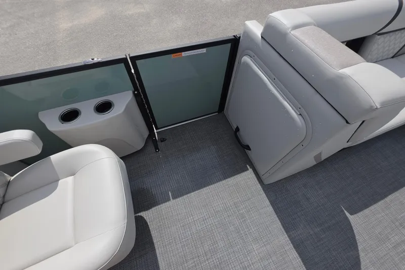 Slide: The Image of Interior of 2026 Crest Conquest 235 SLC boat with seating and cup holders. - 18