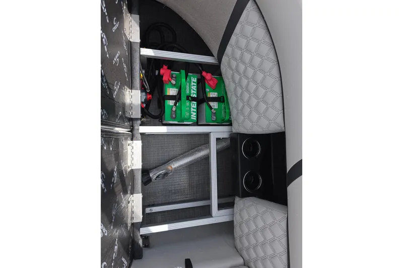 Slide: The Image of Interior view of 2026 Crest Conquest 235 SLC boat with battery storage compartment. - 20