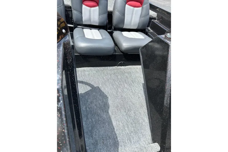 Slide: The Image of Interior of 1988 Aries Bass boat with gray and red seating. - 10