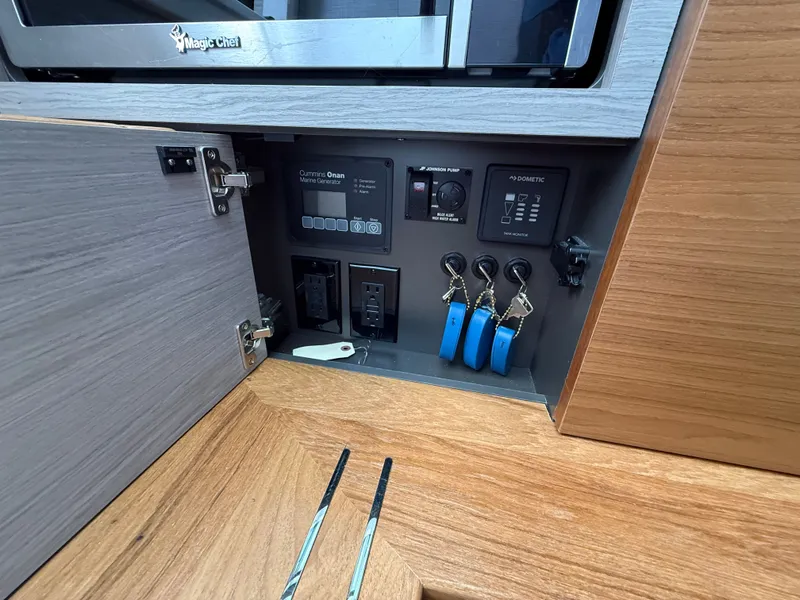 Slide: The Image of Interior view of a 2024 Tiara Yachts 38 LS with control panel and keys. - 43