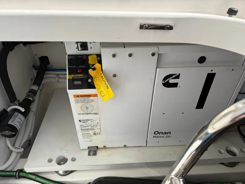 Slide: The Image of An Onan Marine QD generator in a boat engine compartment. - 8