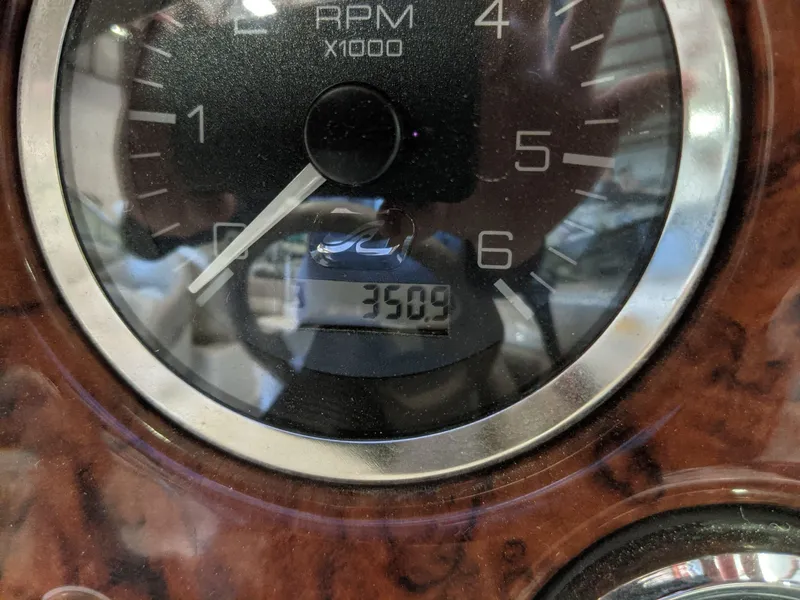 Slide: The Image of Tachometer showing 350.9 operating hours. - 13