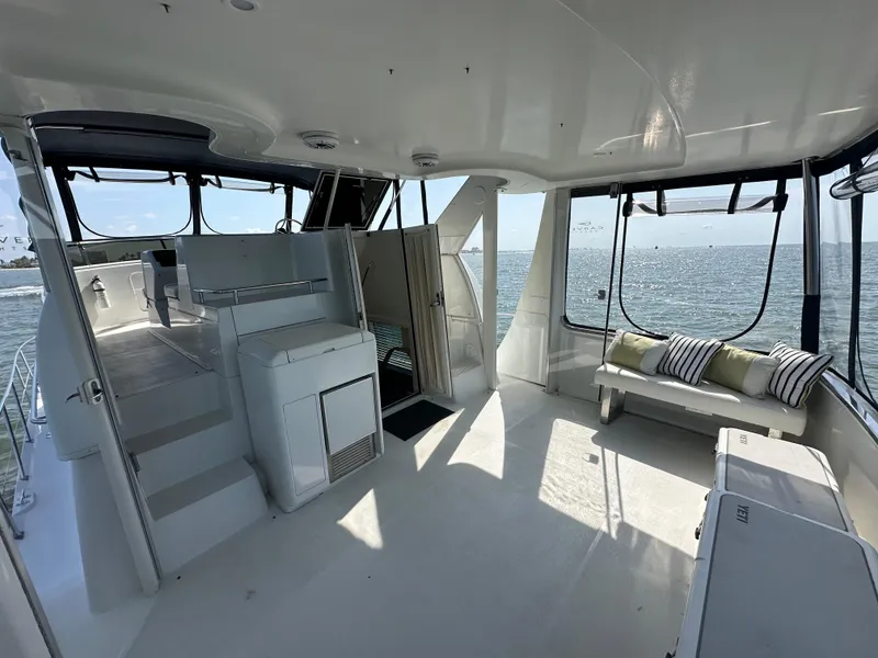Slide: The Image of Spacious interior of a 2000 Carver 406 Motor Yacht with ocean view. - 10