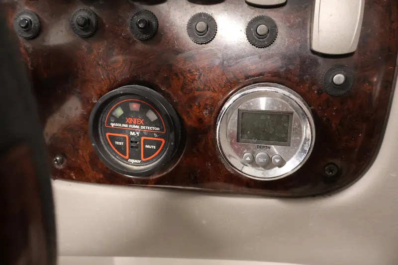 Slide: The Image of Dashboard of 2005 Ebbtide 2300 Sport Cuddy with gasoline fume detector and depth gauge. - 21