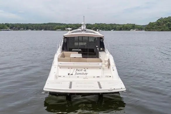 Slide: The Image of 2016 Sea Ray Sundancer 510 yacht on calm lake waters, rear view. - 20