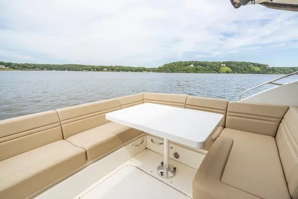 Slide: The Image of Luxurious seating area on 2016 Sea Ray Sundancer 510 yacht with scenic water view. - 23