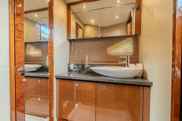 Slide: The Image of Luxurious bathroom interior of 2016 Sea Ray Sundancer 510 yacht with modern fixtures. - 34
