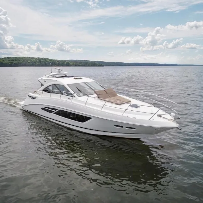 The Image of 2016 Sea Ray Sundancer 510 yacht on calm water, showcasing sleek design and luxury features. - 0