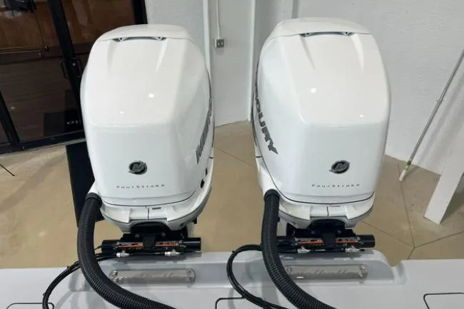 Slide: The Image of Twin Mercury outboard engines on a 2022 Valhalla Boatworks V-33. - 15