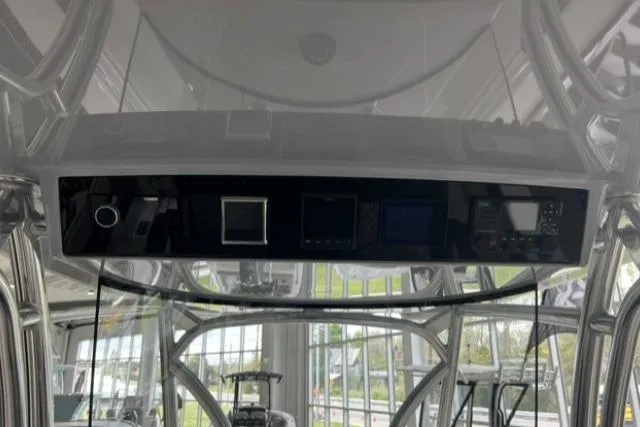 Slide: The Image of 2022 Valhalla Boatworks V-33 helm with advanced navigation controls and sleek design. - 4