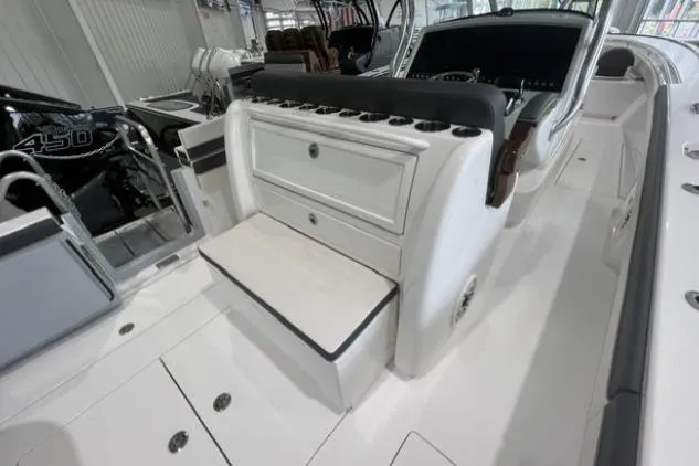 Slide: The Image of 2022 Valhalla Boatworks V-33 interior with seating and storage compartments. - 14