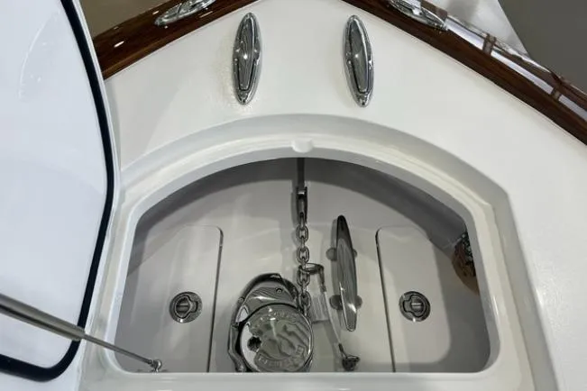 Slide: The Image of 2022 Valhalla Boatworks V-33 anchor compartment with polished metal fittings. - 10