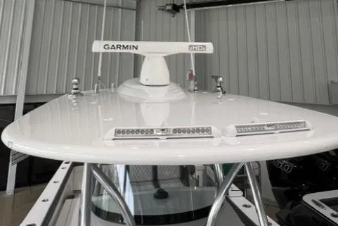 Slide: The Image of 2022 Valhalla Boatworks V-33 with Garmin radar, docked in a covered marina. - 5