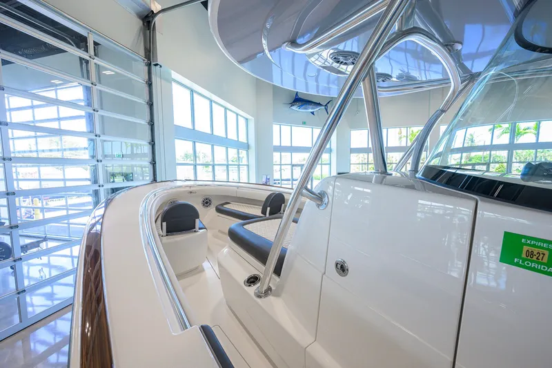 Slide: The Image of 2023 Valhalla Boatworks V-33 interior in showroom, showcasing sleek design and modern features. - 13