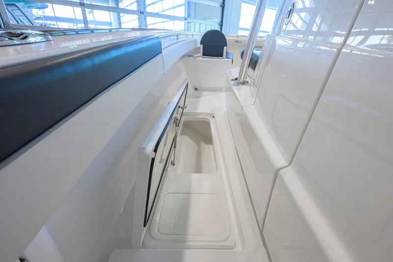 Slide: The Image of 2023 Valhalla Boatworks V-33 interior with sleek storage compartments and modern design. - 48
