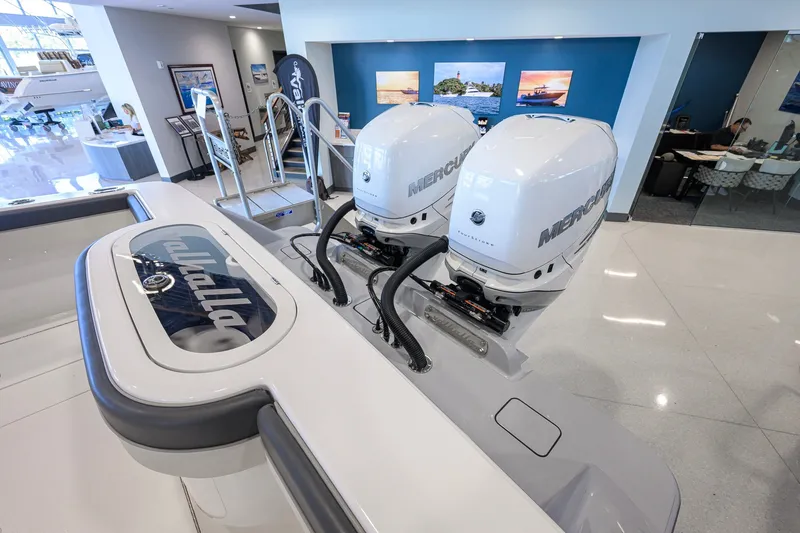 Slide: The Image of 2023 Valhalla Boatworks V-33 with dual Mercury outboard engines in showroom. - 59