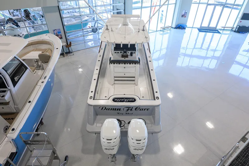 Slide: The Image of 2023 Valhalla Boatworks V-33 in showroom with twin 400 engines. - 61