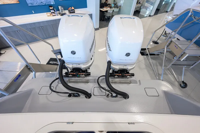 Slide: The Image of 2023 Valhalla Boatworks V-33 with dual Mercury outboard engines in showroom. - 57