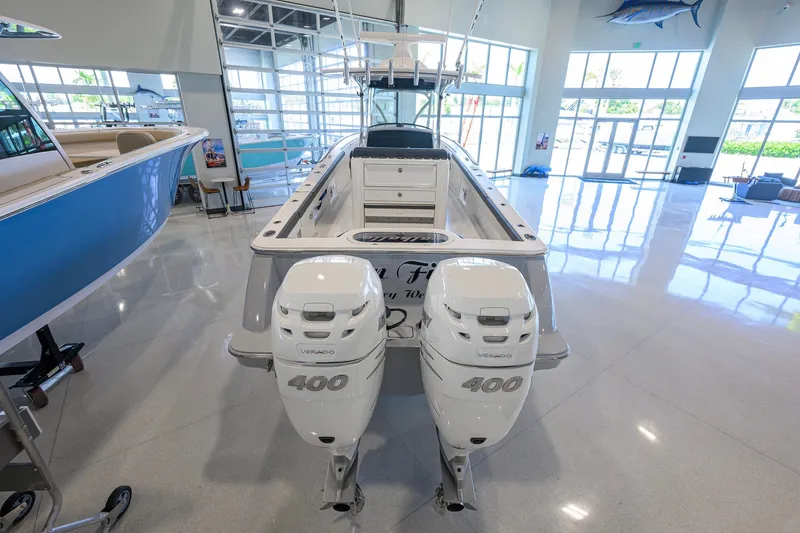 Slide: The Image of 2023 Valhalla Boatworks V-33 with dual 400 Verado engines in showroom. - 60