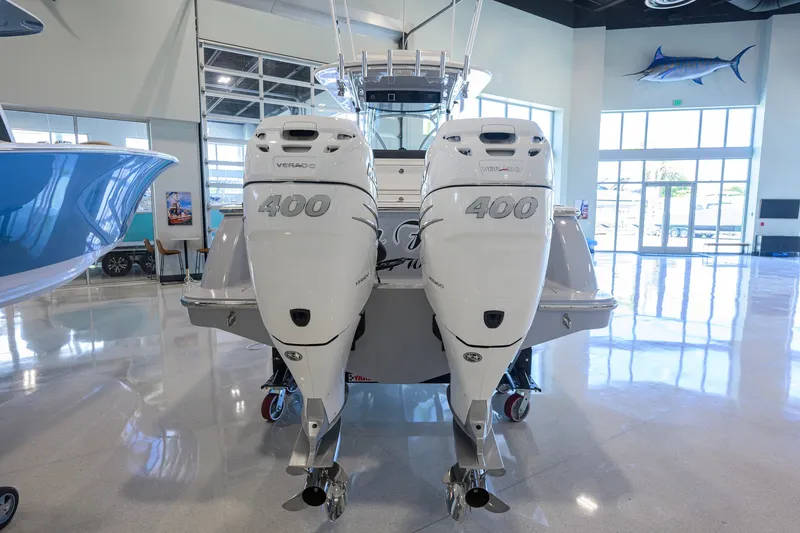 Slide: The Image of 2023 Valhalla Boatworks V-33 with twin 400 horsepower engines in showroom. - 62
