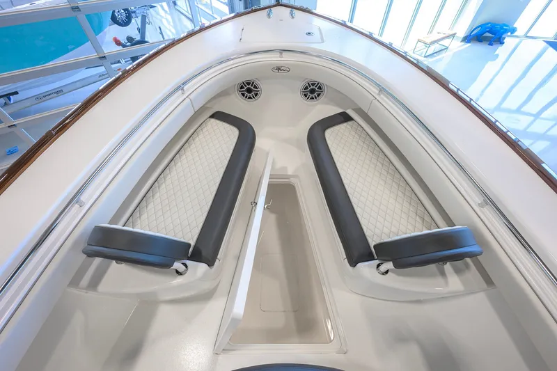 Slide: The Image of 2023 Valhalla Boatworks V-33 interior with cushioned seating and sleek design. - 17