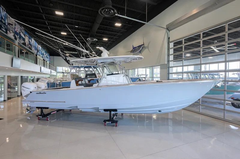 Slide: The Image of 2023 Valhalla Boatworks V-33 displayed indoors, showcasing sleek design and modern features. - 1