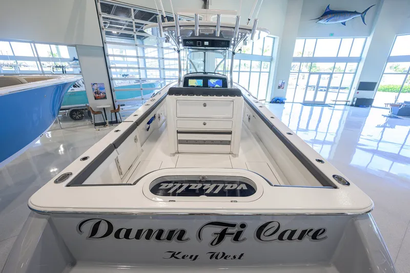 Slide: The Image of 2023 Valhalla Boatworks V-33 interior, featuring sleek design and modern amenities in showroom. - 55