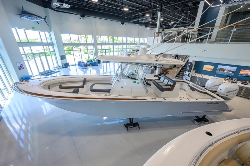 Slide: The Image of 2023 Valhalla Boatworks V-33 displayed indoors, showcasing sleek design and modern features. - 6