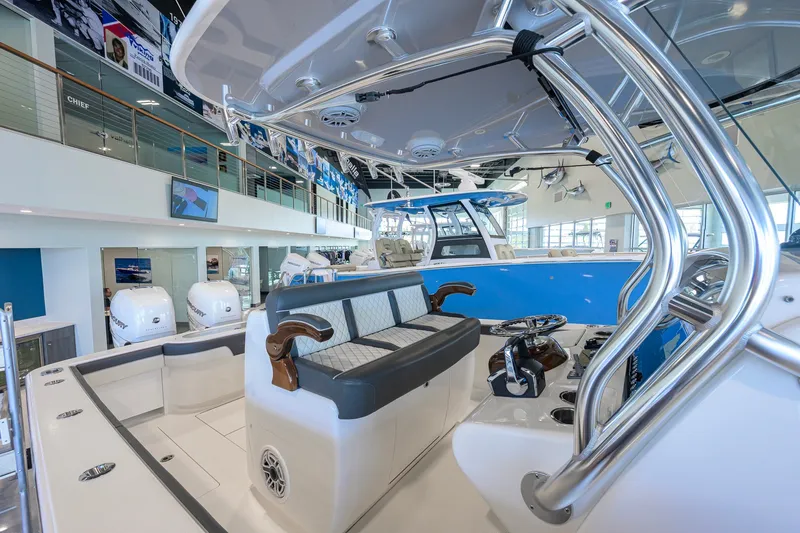 Slide: The Image of 2023 Valhalla Boatworks V-33 interior showcasing sleek design and modern features in showroom. - 27