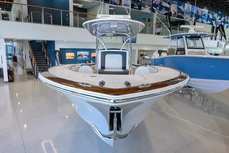 Slide: The Image of 2023 Valhalla Boatworks V-33 displayed in showroom, featuring sleek design and modern amenities. - 4