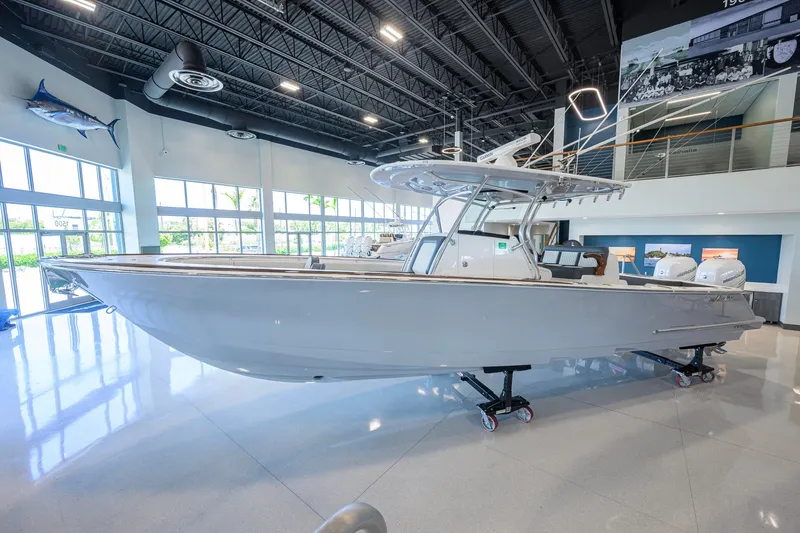 Slide: The Image of 2023 Valhalla Boatworks V-33 displayed indoors, showcasing sleek design and modern features. - 5