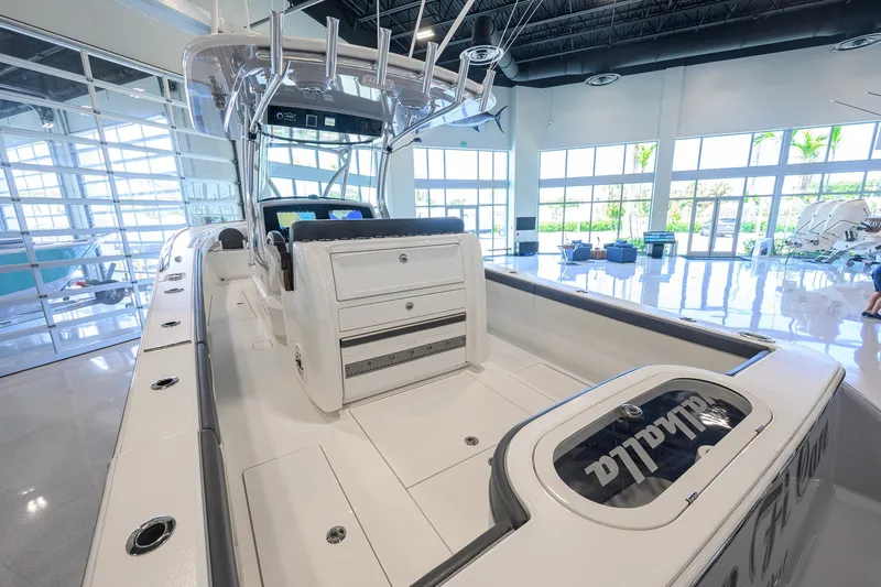 Slide: The Image of 2023 Valhalla Boatworks V-33 interior in showroom, showcasing sleek design and modern features. - 39