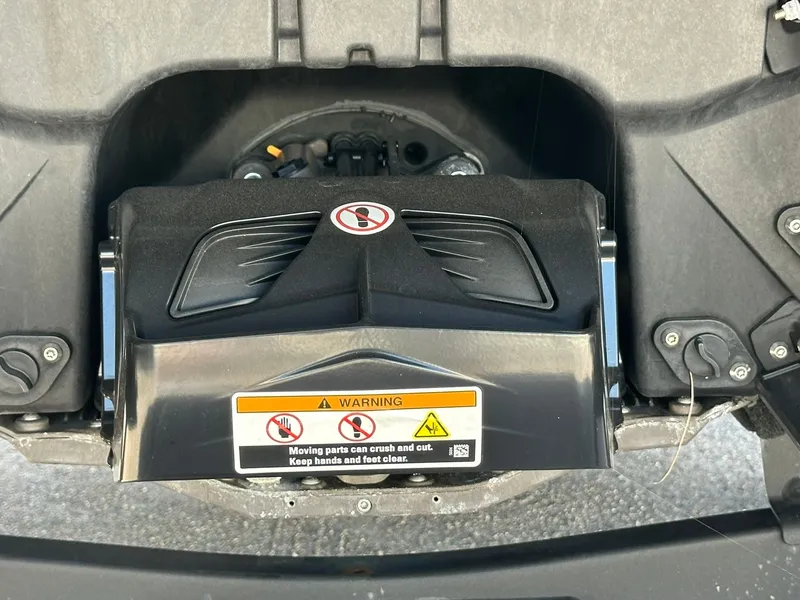 Slide: The Image of Close-up of a part of a 2023 Sea-Doo 21 SWITCH SPORT with warning labels. - 20