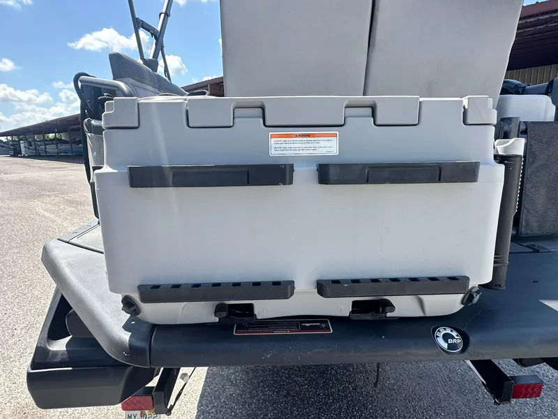 Slide: The Image of A cooler is mounted on the rear of a Sea-Doo 21 SWITCH SPORT. - 21