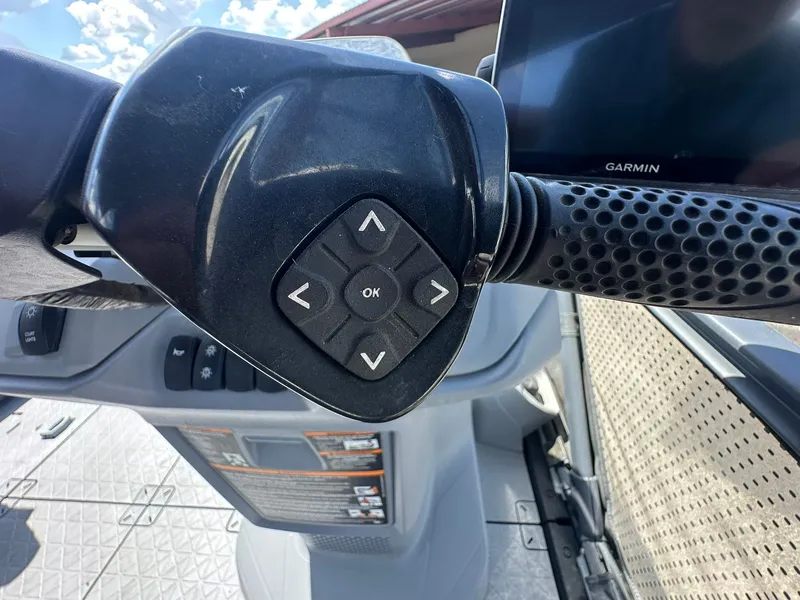Slide: The Image of Close-up of the control area on a Sea-Doo 21 SWITCH SPORT with controls and display. - 25