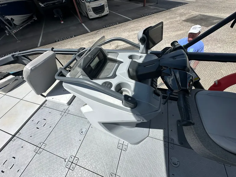 Slide: The Image of The image shows the cockpit of a 2023 Sea-Doo 21 SWITCH SPORT with modern controls. - 30