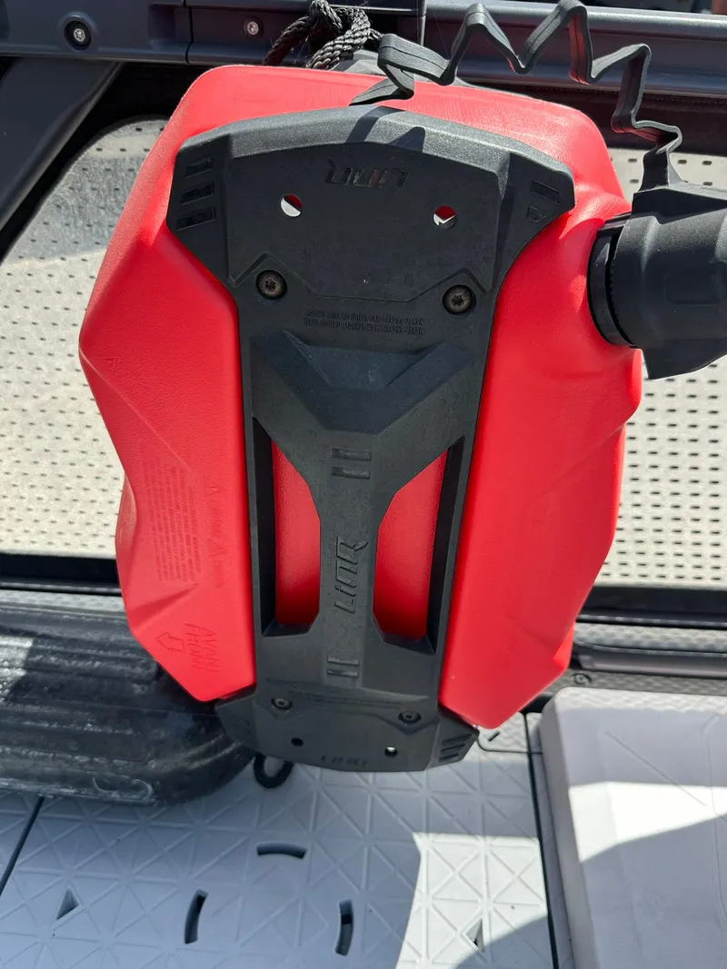 Slide: The Image of A red fuel canister is secured on a Sea-Doo 21 SWITCH SPORT. - 36
