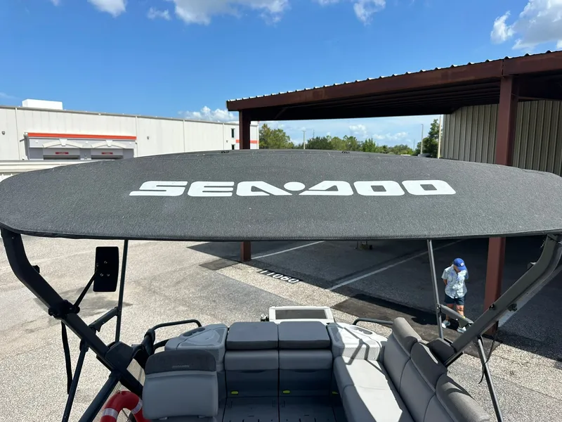 Slide: The Image of Sea-Doo 21 SWITCH SPORT 2023 with sunshade at the dock. - 37
