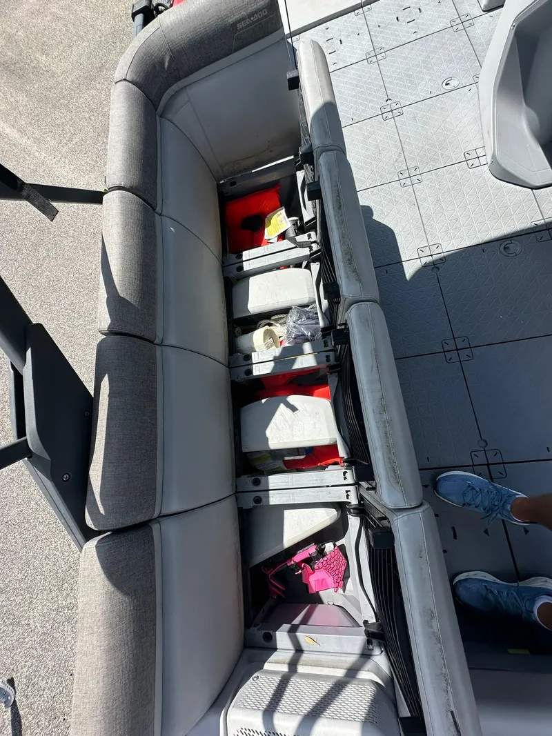Slide: The Image of Interior view of a 2023 Sea-Doo 21 SWITCH SPORT with seating and storage underneath. - 39