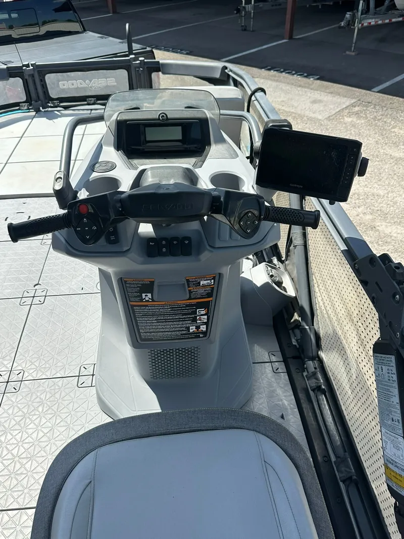 Slide: The Image of The image shows the helm of a 2023 Sea-Doo 21 SWITCH SPORT. - 42