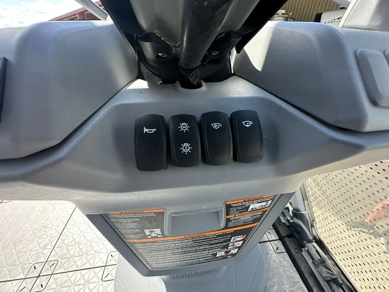 Slide: The Image of Close-up of a Sea-Doo 21 SWITCH SPORT control console with various switches. - 44