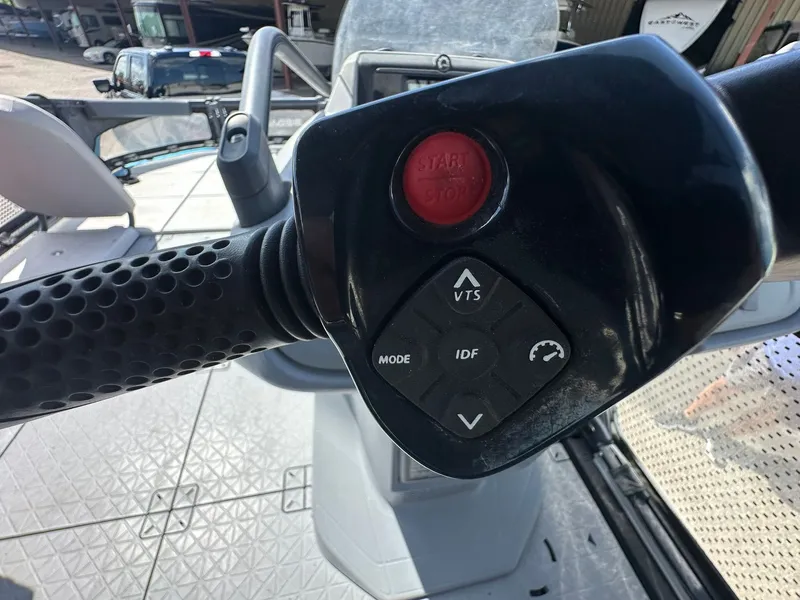 Slide: The Image of Close-up of a Sea-Doo 21 SWITCH SPORT handlebar with various controls. - 49