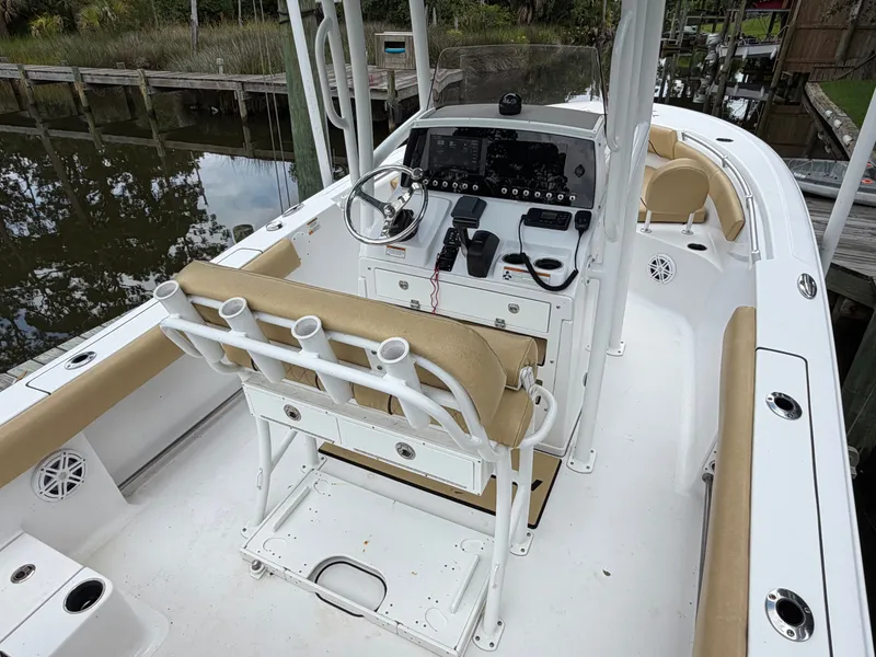 Slide: The Image of 2021 Sportsman Heritage 211 Center Console with helm and seating bench. - 17