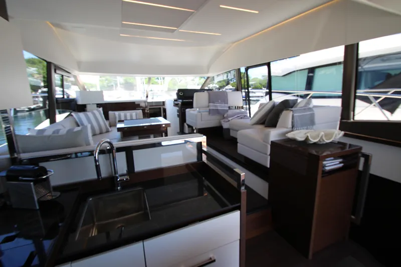 Slide: The Image of Luxurious interior of 2022 Prestige 520 yacht with modern furnishings and sleek design. - 28