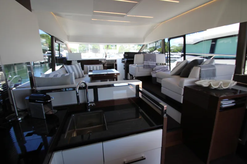 Slide: The Image of Luxurious interior of 2022 Prestige 520 yacht with modern furnishings and sleek design. - 29
